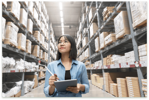 Worker taking inventory of stock